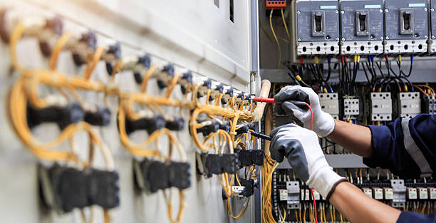 Professional Electrician technician working in East Meadow, NY